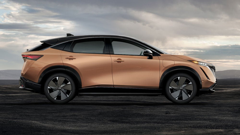 Nissan ARIYA in Sunrise Copper in dramatic landscape | Nissan City of Red Bank in Red Bank NJ