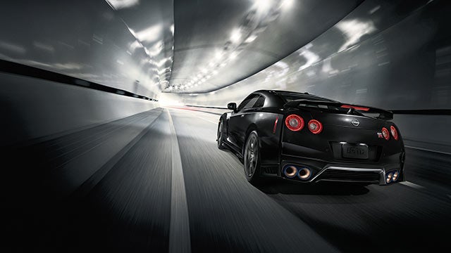 2023 Nissan GT-R seen from behind driving through a tunnel | Nissan City of Red Bank in Red Bank NJ